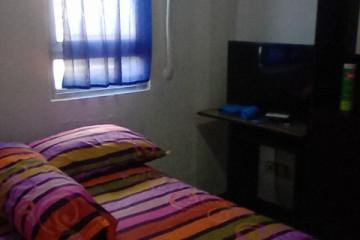 Bedroom Low Floor 1BR Apartment with Swimming Pool View at Modernland Golf Apartment