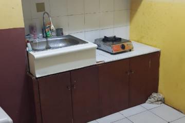 Kitchen Low Floor 1BR Apartment with Swimming Pool View at Modernland Golf Apartment