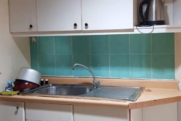 Kitchen Trendy 2BR Apartment High Floor with Pool View at Taman Anggrek Condominium Apartment