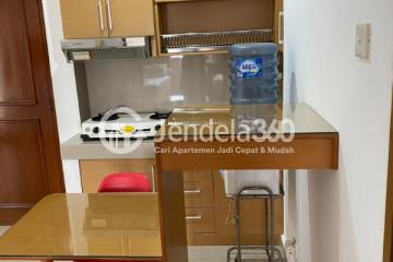 Kitchen Homey 2BR Apartment Low Floor with City View at Mediterania Gajah Mada Apartment