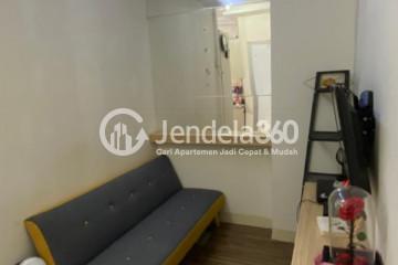 Living Room 1BR Green Pramuka City Apartment at Middle Floor