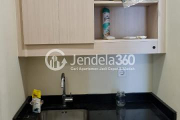 Kitchen Relaxed Studio Apartment Middle Floor with city View at The Mansion Kemayoran Bougenville