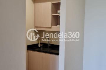 Kitchen Relaxed Studio Apartment Middle Floor with city View at The Mansion Kemayoran Bougenville