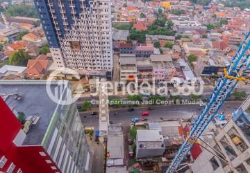 Balcony High Floor Studio Apartment with City View at Taman Melati Margonda Apartment