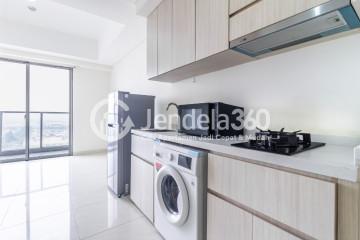 Kitchen Fancy Studio Apartment Middle Floor with Lake View at Sedayu City Apartment