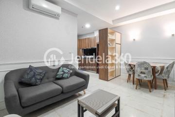 Living Room Compact 1BR Apartment Middle Floor with City and Front Park View at Lavenue Apartment