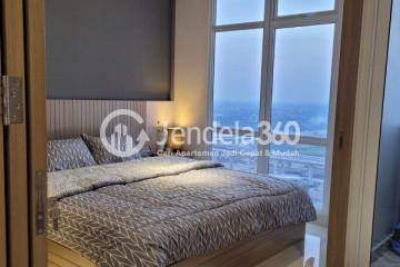 Bedroom High Floor 1BR Apartment with City View at Vasanta Innopark Apartment