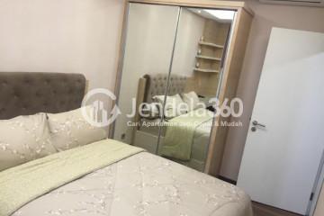 Bedroom 1BR Apartment with Pool View at Saveria Apartment