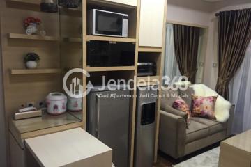 Living Room 1BR Apartment with Pool View at Saveria Apartment