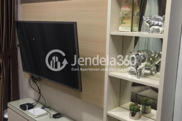 Living Room 1BR Apartment with Pool View at Saveria Apartment