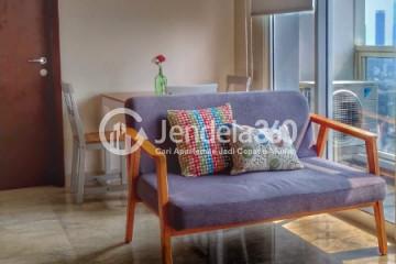 Living Room High Floor 2BR Apartment with City View at Menteng Park