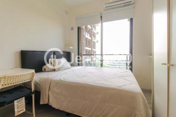 Bedroom Elegant Studio Apartment with City View at Sky House BSD Apartment