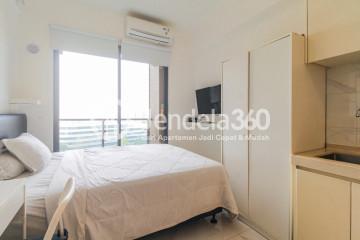 Bedroom Elegant Studio Apartment with City View at Sky House BSD Apartment