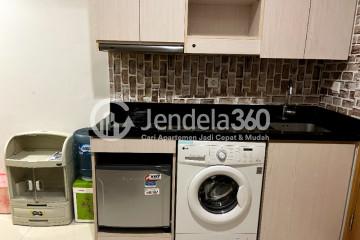 Kitchen Modern 1BR Apartment Middle Floor with City View at The Mansion Kemayoran Bougenville