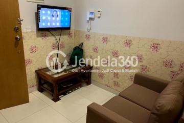 Living Room Modern 1BR Apartment Middle Floor with City View at The Mansion Kemayoran Bougenville