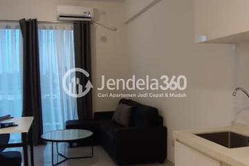 Living Room Relaxed 2BR Apartment Low Floor with City View at Sky House BSD Apartment