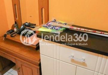 Living Room Homey 2BR Apartment at Cibubur Village Apartment Middle Floor
