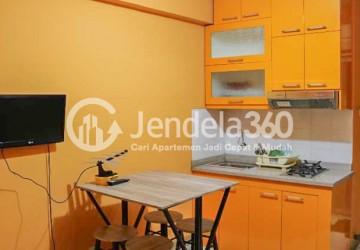 Living Room Homey 2BR Apartment at Cibubur Village Apartment Middle Floor