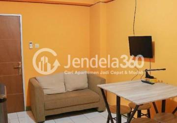 Living Room Homey 2BR Apartment at Cibubur Village Apartment Middle Floor