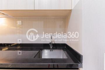 Kitchen Restful 1BR Apartment with Exotic Sky Pool at Southgate Residence