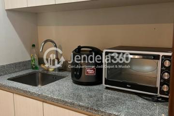 Kitchen Comfortable 2BR Apartment at District 8 Tower Infinity