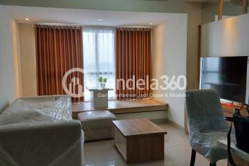 Living Room 2BR Apartment with City View at Orange County Lippo Cikarang