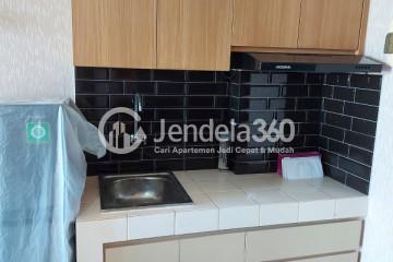 Kitchen Well Furnished 2BR Apartment Middle Floor with City View at Serpong Green View Apartment