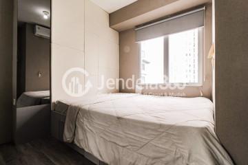 Bedroom 1 Tranquil 2BR Apartment at Bassura City Apartment Tower Heliconia