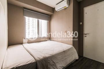 Bedroom 1 Tranquil 2BR Apartment at Bassura City Apartment Tower Heliconia