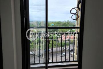 Balcony Relaxed 2BR Apartment at Transpark Cibubur Apartment Tower Borealis