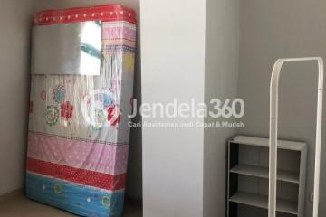 Bedroom Relaxed 1BR Apartment High Floor with City View at Pesona Bahari Apartment