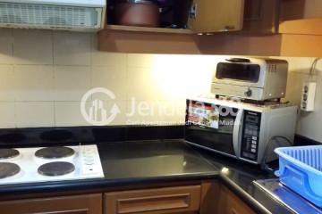 Kitchen Relaxed 2BR Apartment Middle Floor with City View at Somerset Grand Citra Kuningan