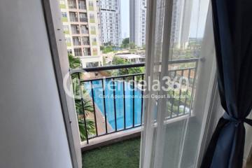 Balcony Peaceful 2BR Apartment Low Floor with  View at Serpong Green View Apartment