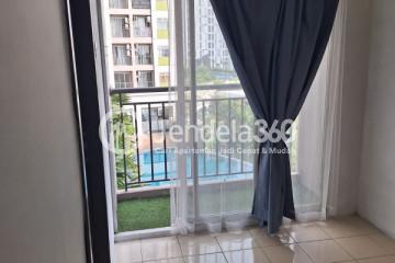 Living Room Peaceful 2BR Apartment Low Floor with  View at Serpong Green View Apartment