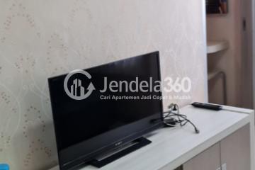 Living Room Cozy 2BR Apartment at Puncak Permai Apartment Low Floor