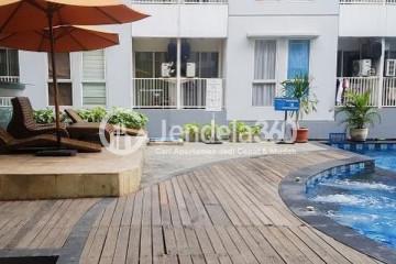 Balcony Low Floor Studio Apartment with pool View at Tamansari Skylounge Apartment