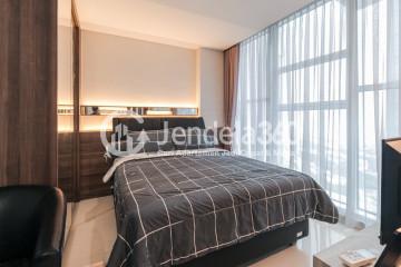 Bedroom Tidy Studio Apartment at Brooklyn Alam Sutera Apartment with City View
