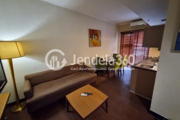 Living Room Low Floor 2BR Apartment with city View at Aston Marina Ancol