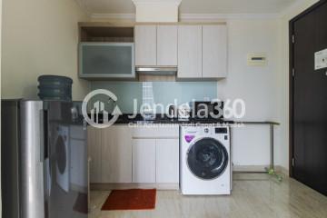 Kitchen Restful 1BR Apartment High Floor with City View at Menteng Park