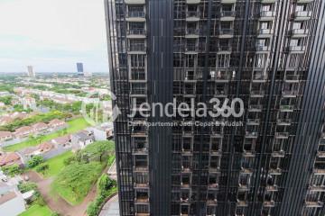 Balcony Middle Floor Studio Apartment with City View at Brooklyn Alam Sutera Apartment