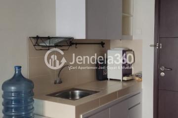 Kitchen Studio Apartment with Swimming Pool View at Saveria Apartment