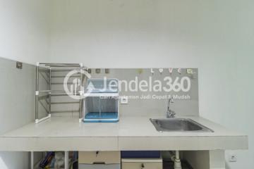 Kitchen Peaceful Studio Apartment at Puri Orchard Apartment Low Floor