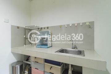 Kitchen Peaceful Studio Apartment at Puri Orchard Apartment Low Floor