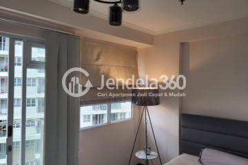 Bedroom Cozy 1BR Apartment Low Floor with  View at Gateway Pasteur Apartment