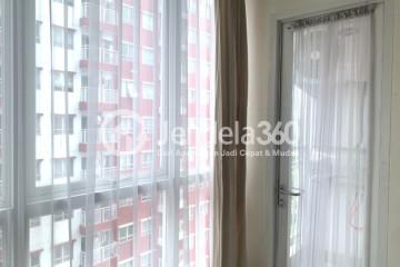 Bedroom Strategic Location Studio Apartment Middle Floor with City View at Taman Melati Margonda Apartment