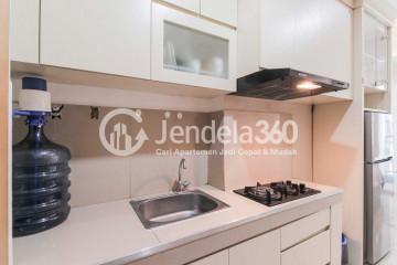 Kitchen Low Floor Studio Apartment with Swimming pool View at The Nest Apartment