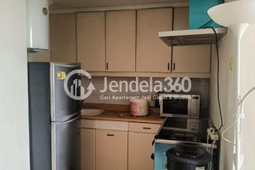 Kitchen Low Floor 1BR Apartment with City View at Puri Imperium Apartment