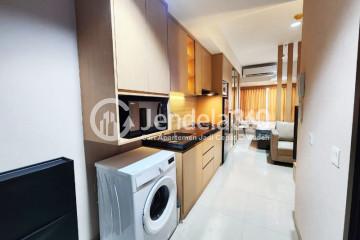 Kitchen 1BR Apartment with City View at Orange County Lippo Cikarang