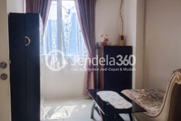 Living Room Strategic Location 1BR Apartment Middle Floor with  View at Kalibata City Green Palace