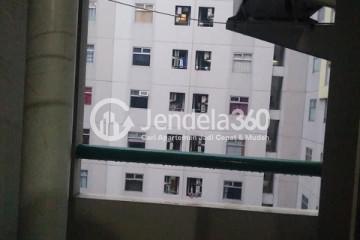 Balcony Middle Floor 2BR Apartment with City View at Kalibata City Apartment